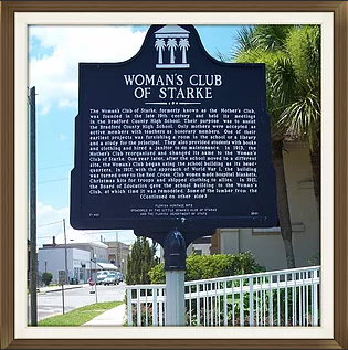 The sign outside the Woman's Club building